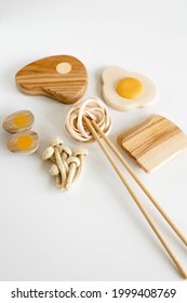 Wooden Toy Food Includes Eggs, Spagetti, Mushrooms, Steak And Bread On White Minimalistic Backgrownd. Play For Preschool Children.