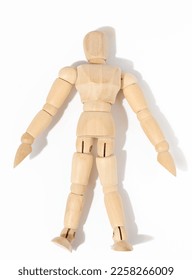 Wooden toy mannequin, marionette on a white background - Shutterstock ID 2258266009
