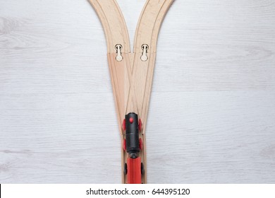 Wooden Toy Train Approaching A Fork In The Line Or Track Viewed From Above In A Concept Of Choice And Opportunity