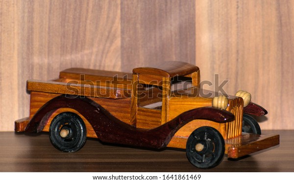 Wooden toy.\
Vintage car toys. Decorative\
element.