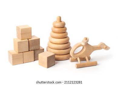 Wooden Toys Isolated On White Background, Cubes, Pyramid, Helicopter