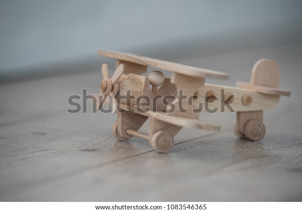 wooden toys, wooden plane and\
car