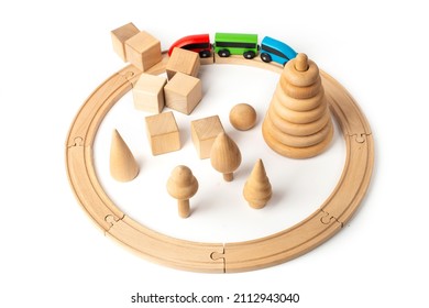 Wooden Toys Train And Pyramid On A White Background. Wooden Toy Train Isolated On White Background