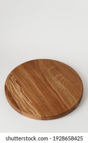 Wooden Tray With A Round Shape. Beautiful Ash Wood Texture. Cookware Made Of Natural Materials.