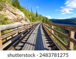 Wooden trestle bridge along the Myra Canyon Trestles trail, a section of the Kettle Valley Rail Trail located south of Kelowna on Okanagan Mountain, British Columbia, Canada