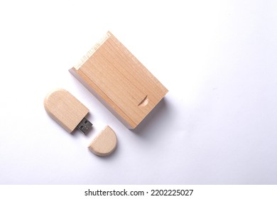 Wooden usb flashdisk in the wooden box isolated in white background