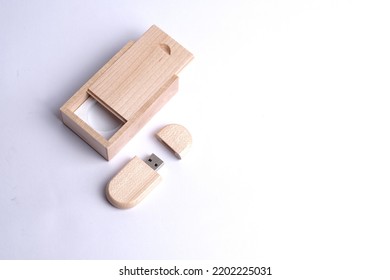 Wooden usb flashdisk in the wooden box isolated in white background