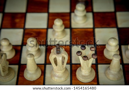 wooden vintage chessboard with chess