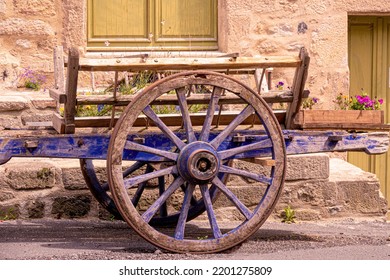 Wooden Vintage Wagon On Stone Wall Background