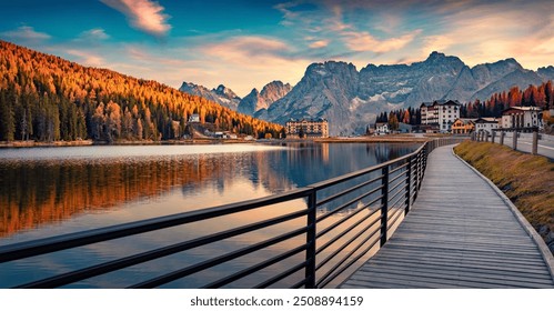 Wooden walkway in Misurina village, Italy, Europe. Picturesque autumn sunset on Misurina lake. Wonderful morning scene of Dolomite Alps. Traveling concept background. - Powered by Shutterstock