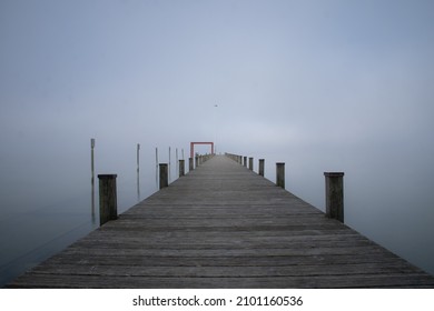 A wooden walkway on a foggy day - Powered by Shutterstock