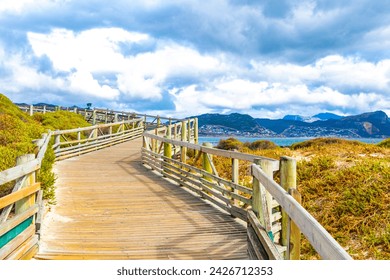 Wooden Walkway Railings and Steps at Boulders Beach by the Penguins in Simons Town Cape Town Capetown Western Cape South Africa Southafrica. - Powered by Shutterstock