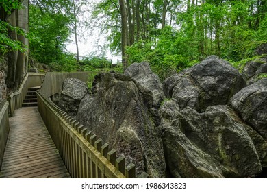 Wooden Walkway And Rocks In The Felsenmeer Geotope In Hemer