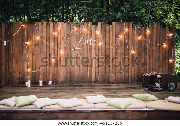 Wooden Wall Decorated By Electric Lamps Stock Photo Edit Now