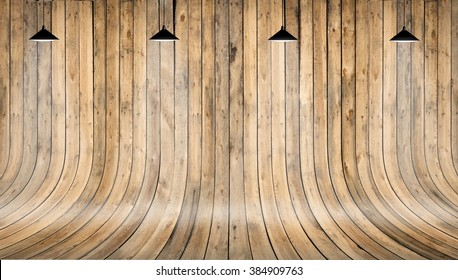 Wooden wall and floor with shining lamp on top. Background texture