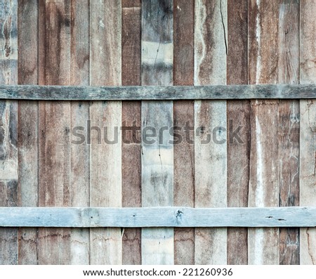 Wooden wall of old hut in the rural of Thailand.