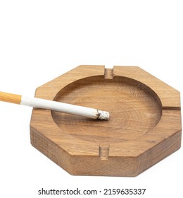 Wooden Walnut Ashtray Isolated Above White Background With Copy Space.