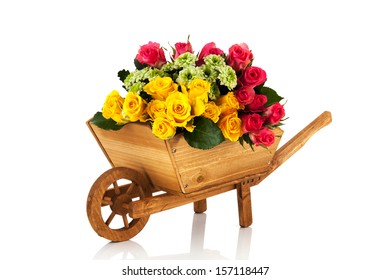 Wooden Wheel Barrow With Colorful Flowers