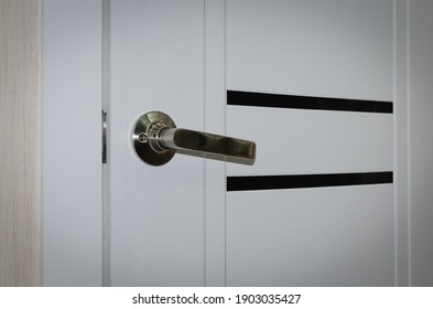 Wooden White Door With Handle And Lock.