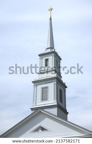 Wooden White Steeple over Old New England Church