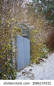 Wooden Wicket In A Fence In The Winter 