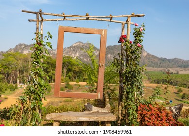 Wooden Window Frame Hanging To Decorate The Garden And To Be A Cool Photo Corner.