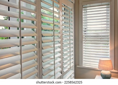 Wooden window shutters in modern interiors 