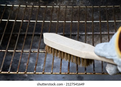 Wooden Wire Brush Cleans Dirty Barbecue Grill Rust. Leather Protection Gloves.