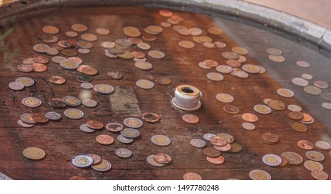 Wooden Wishing Well With Coins