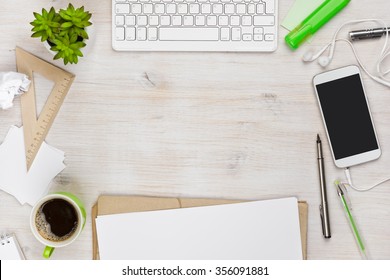 Wooden Work Desk Top View With Copyspace In The Middle