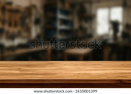 Wooden Workbench Table in Workshop Background. Empty Wood Surface for Product Display, Carpentry, DIY, Hand Tools, Garage, Industrial, Blurred Background, Rustic, Craftsmanship. For display or montage