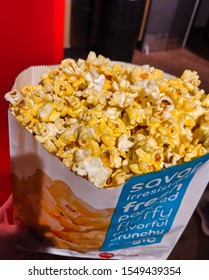 Woodinville, WA / USA - November 2nd, 2019: AMC Regular Size Consession Stand Buttery Popcorn.