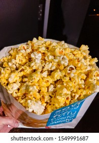 Woodinville, WA / USA - November 2nd, 2019: AMC Regular Size Consession Stand Buttery Popcorn.