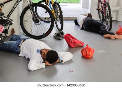 Woodlands / Singapore - June 13th 2019: Foreign Worker Are Taking A Nap At The Void Deck Area.