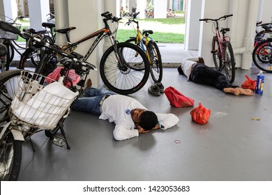 Woodlands / Singapore - June 13th 2019: Foreign Worker Are Taking A Nap At The Void Deck Area.