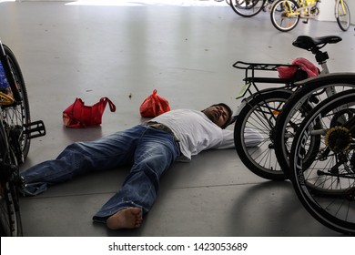 Woodlands / Singapore - June 13th 2019: Foreign Worker Are Taking A Nap At The Void Deck Area.