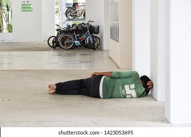 Woodlands / Singapore - June 13th 2019: Foreign Worker Are Taking A Nap At The Void Deck Area.