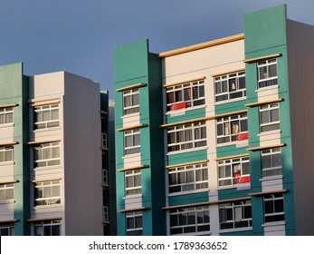 Woodlands,Singapore 15 July/2020 People Are Hanging Flag For Celebrating National Day SG 55 At Woodlands HDB During COVID-19 Pandemic