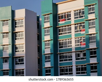 Woodlands,Singapore 15 July/2020 People Are Hanging Flag For Celebrating National Day SG 55 At Woodlands HDB During COVID-19 Pandemic