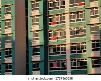 Woodlands,Singapore 15 July/2020 People Are Hanging Flag For Celebrating National Day SG 55 At Woodlands HDB During COVID-19 Pandemic