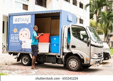 Woodlands/Singapore: 7th June 2017- A young man is delivering products from using his van in the neighborhood. - Shutterstock ID 655241224