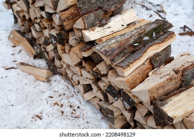 Woodpile Of Cut Lumber For Forestry Industry. Billets For The Winter Season Firewood.