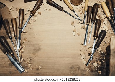 Woodwork, carving tools and chisel in workshop for craftsmanship, diy renovation or timber trade. Production equipment, carpentry or manufacturing instrument for handmade design and top view mockup - Powered by Shutterstock