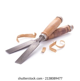 Woodworking Carpenter Chisel Tool Closeup And Wood Shavings Isolated On White Background. Chisel As Joiner Tool