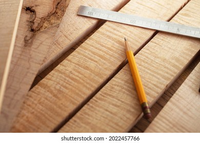 Woodworking With Curly Maple (or Tiger Maple) A Sought After And Prized Wood For Its Beautiful Figured Grain. Wood Working Lumber On Work Bench.Shallow Depth Of Field.