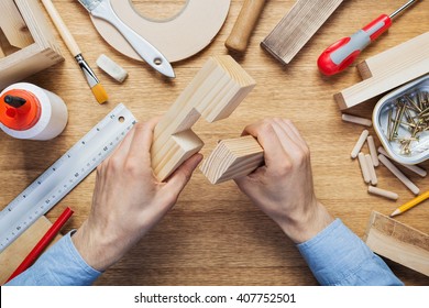 Woodworking Workshop Table Top Scene. Making Of Wood Joint. DIY Concept.