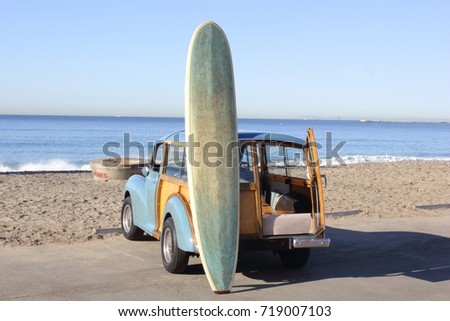 Woody at the Beach in Southern California with Surfboard