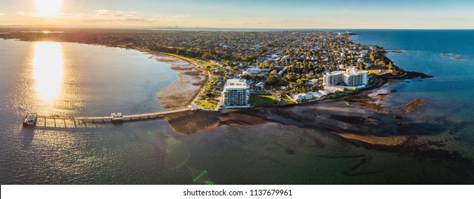 Woody Point Jetty is famous landmark on the Moreton Bay on Redcliffe peninsula, Brisbane, Australia - Powered by Shutterstock