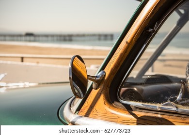 Woody Surf Classic Car In California At The Beach With Pier Summer