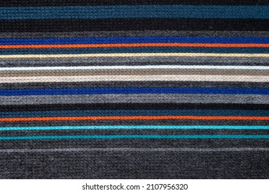 Wool fabric knitted with horizontal lines in color version.